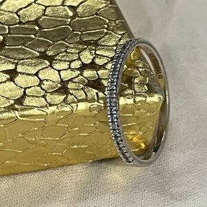 Micro pave half eternity ring